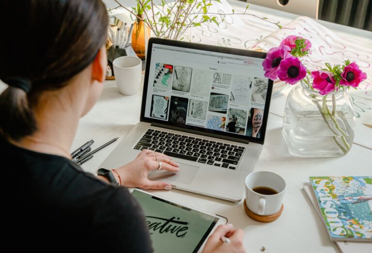 Website design company in Indore - designer working on laptop